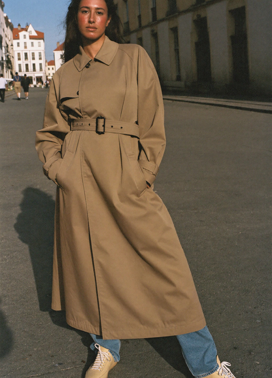 AI fashion lookbook: model wearing a seasonal outfit on location
